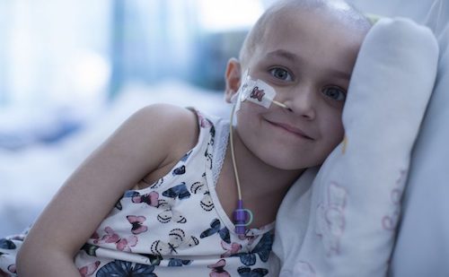 Child who is suffering with Cancer smiling